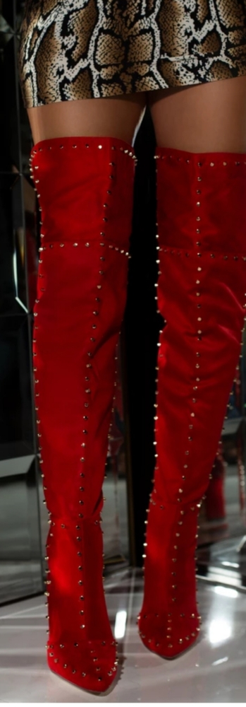 Red thigh high boots with gold grommets